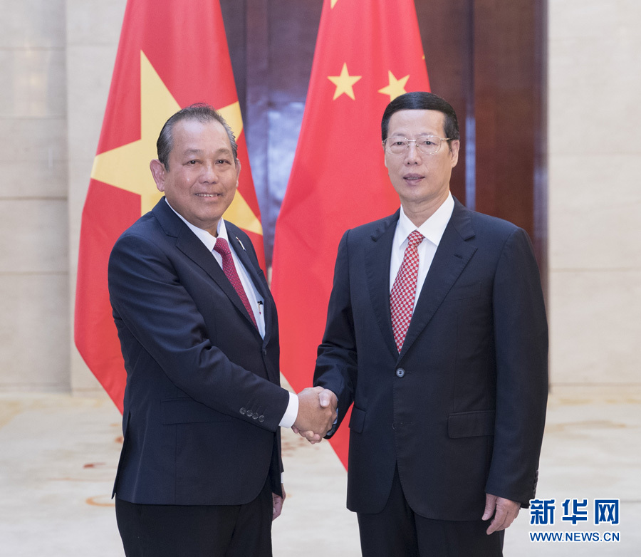  9月11日，中共中央政治局常委、國務院副總理張高麗在廣西南寧會見前來出席第十四屆中國－東盟博覽會和中國－東盟商務與投資峰會的越南常務副總理張和平。新華社記者王曄攝