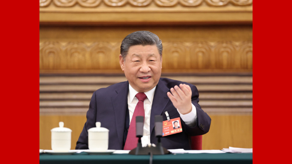 東風浩蕩，弄潮兒向濤頭立